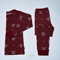 Kolam Kaleidoscope toddler pajama set with geometric print on a beige background