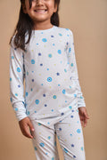 Nazar Nights toddler pajama set with evil-eye print on a beige background